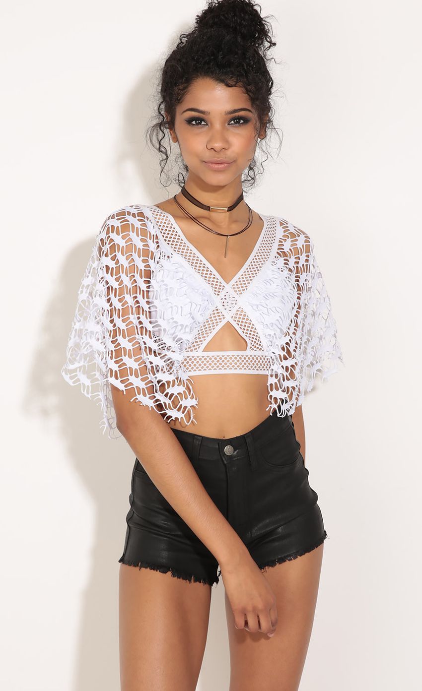 Picture Crochet Cut-Out Crop Top. Source: https://media-img.lucyinthesky.com/data/Jun16_2/850xAUTO/0Y5A95191.JPG