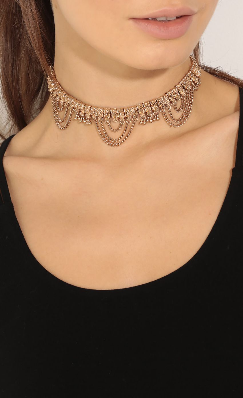 Picture Chain Embellished Choker Necklace In Gold. Source: https://media-img.lucyinthesky.com/data/Jun16_2/850xAUTO/0Y5A9814.JPG