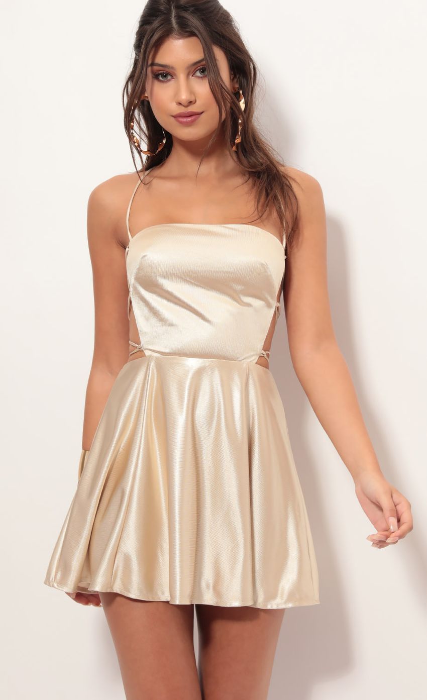 Picture Nina Cutout A-line Dress in Champagne. Source: https://media-img.lucyinthesky.com/data/Jun19_1/850xAUTO/781A2261.JPG