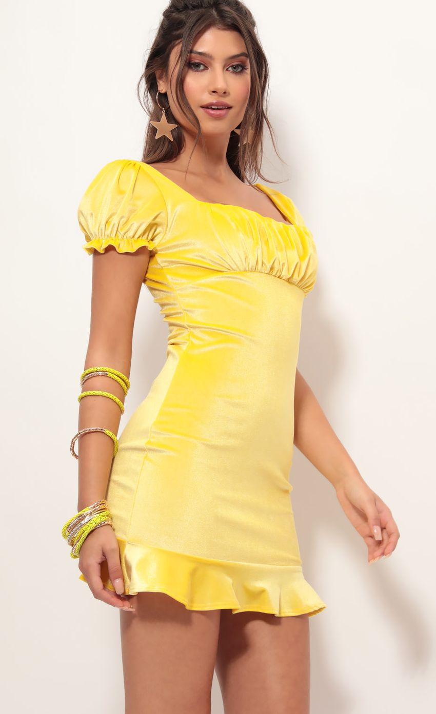 Picture Kristina Puff Sleeve Velvet Dress in Yellow. Source: https://media-img.lucyinthesky.com/data/Jun19_1/850xAUTO/781A2935.JPG