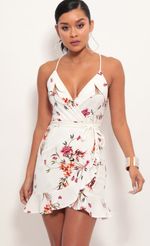 Picture Ruffle Dress in White Floral. Source: https://media-img.lucyinthesky.com/data/Jun19_2/150xAUTO/781A6003.JPG