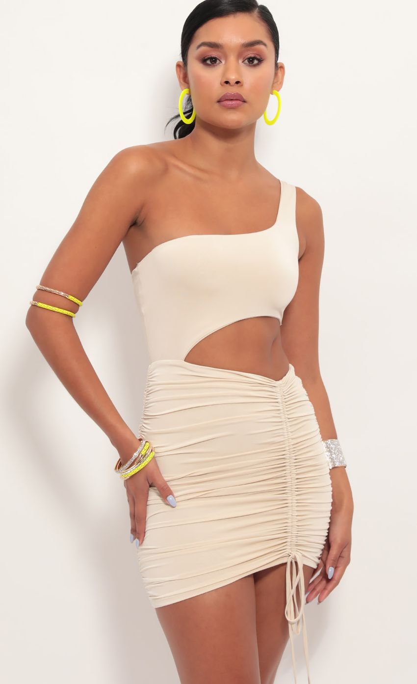 Picture One shoulder Ruched Cutout Dress in Champagne. Source: https://media-img.lucyinthesky.com/data/Jun19_2/850xAUTO/781A6463.JPG