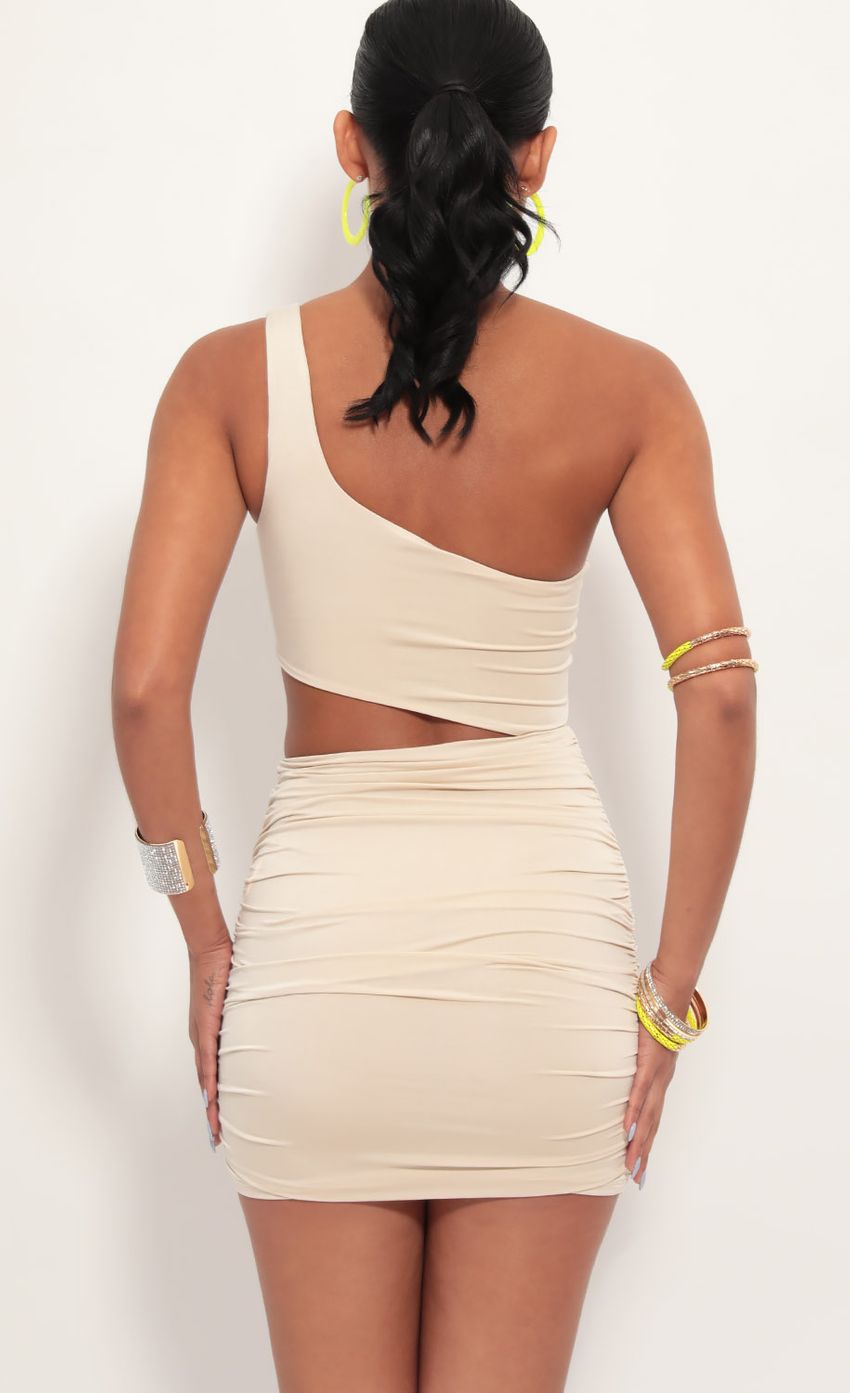 Picture One shoulder Ruched Cutout Dress in Champagne. Source: https://media-img.lucyinthesky.com/data/Jun19_2/850xAUTO/781A6485.JPG