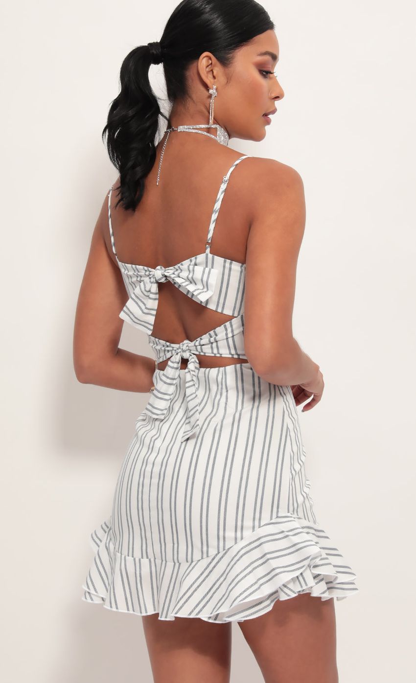 Picture Aubrey Ruffle Dress In White Stripes. Source: https://media-img.lucyinthesky.com/data/Jun19_2/850xAUTO/781A7583.JPG