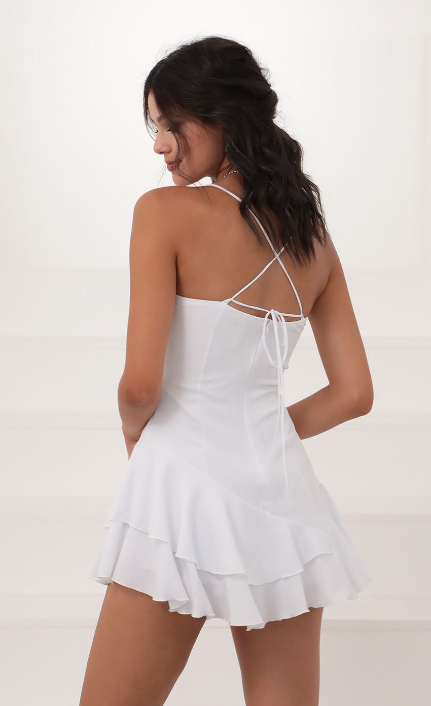 Picture Asymmetrical Frill Dress in White. Source: https://media-img.lucyinthesky.com/data/Jun20_1/850xAUTO/781A3014.JPG