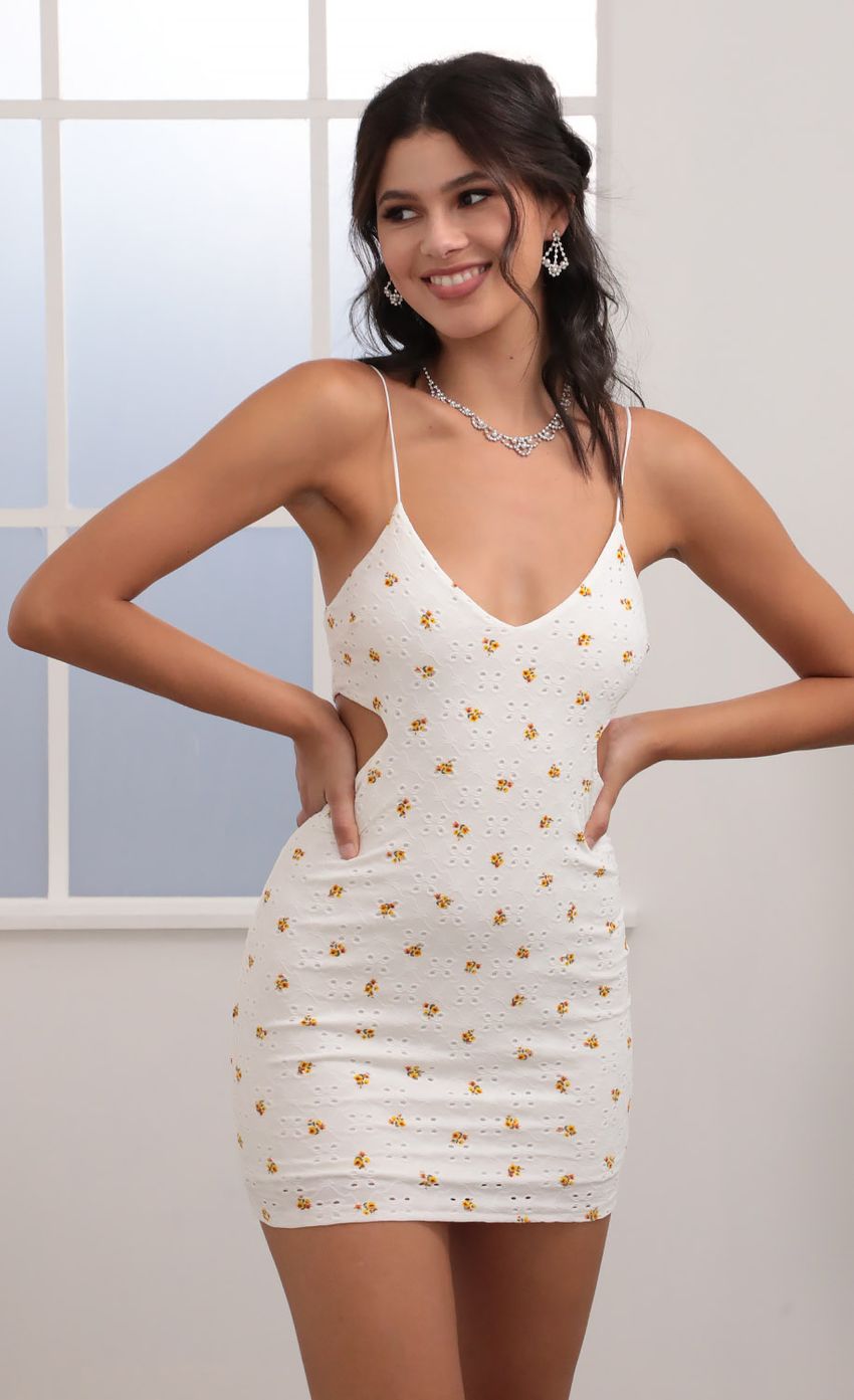 Picture Eyelet Floral Hourglass Dress in White. Source: https://media-img.lucyinthesky.com/data/Jun20_1/850xAUTO/781A3266.JPG