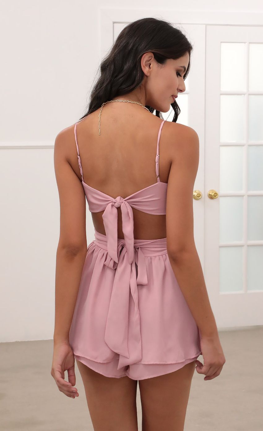 Picture Double Ruffle Romper in Pink. Source: https://media-img.lucyinthesky.com/data/Jun20_1/850xAUTO/781A6353.JPG