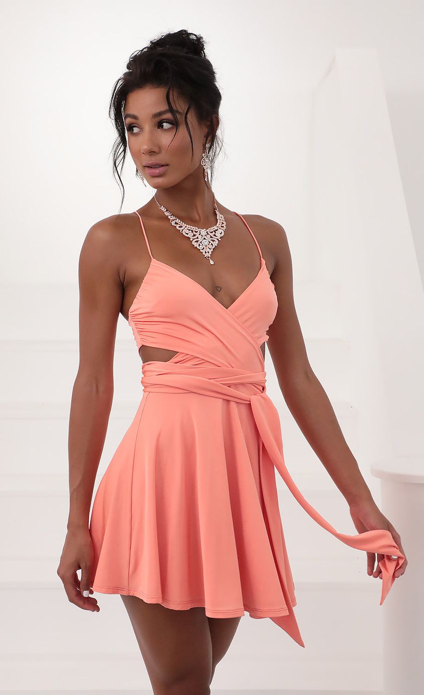 Picture Wrap Dress in Coral. Source: https://media-img.lucyinthesky.com/data/Jun20_2/850xAUTO/781A5534.JPG