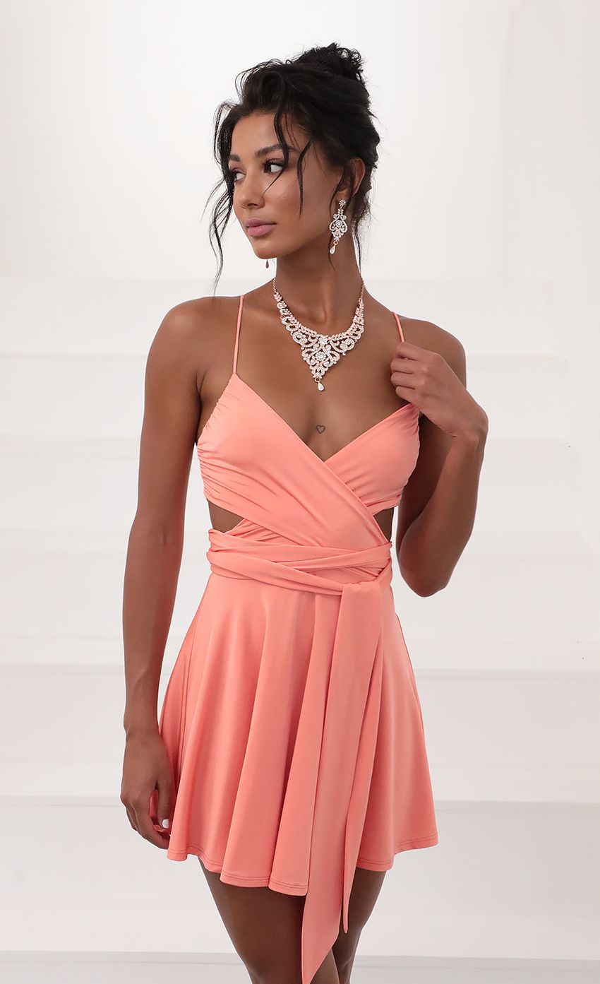 Picture Wrap Dress in Coral. Source: https://media-img.lucyinthesky.com/data/Jun20_2/850xAUTO/781A5554.JPG
