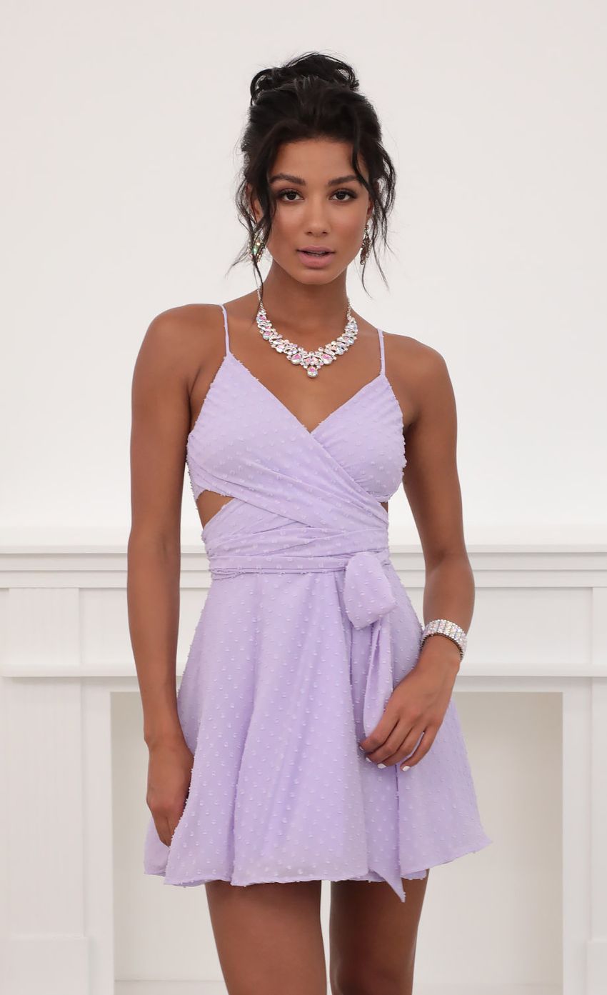 Picture Jillian Chiffon Wrap Dress in Lavender Dots. Source: https://media-img.lucyinthesky.com/data/Jun20_2/850xAUTO/781A6839.JPG