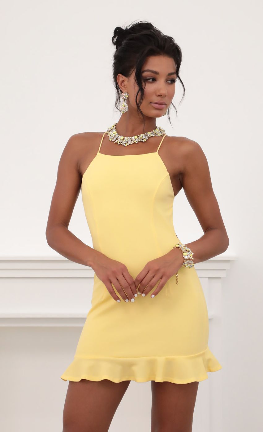 Picture Halter Ruffle Dress in Yellow. Source: https://media-img.lucyinthesky.com/data/Jun20_2/850xAUTO/781A7365.JPG