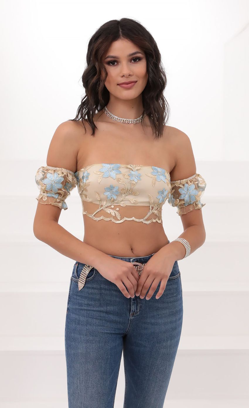 Picture Daydream Lace Puff Sleeve Top in Gold. Source: https://media-img.lucyinthesky.com/data/Jun20_2/850xAUTO/781A8995.JPG