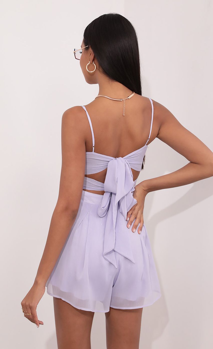 Picture Lavender Romper with Silver Pinstripes. Source: https://media-img.lucyinthesky.com/data/Jun21_1/850xAUTO/1V9A2213.JPG