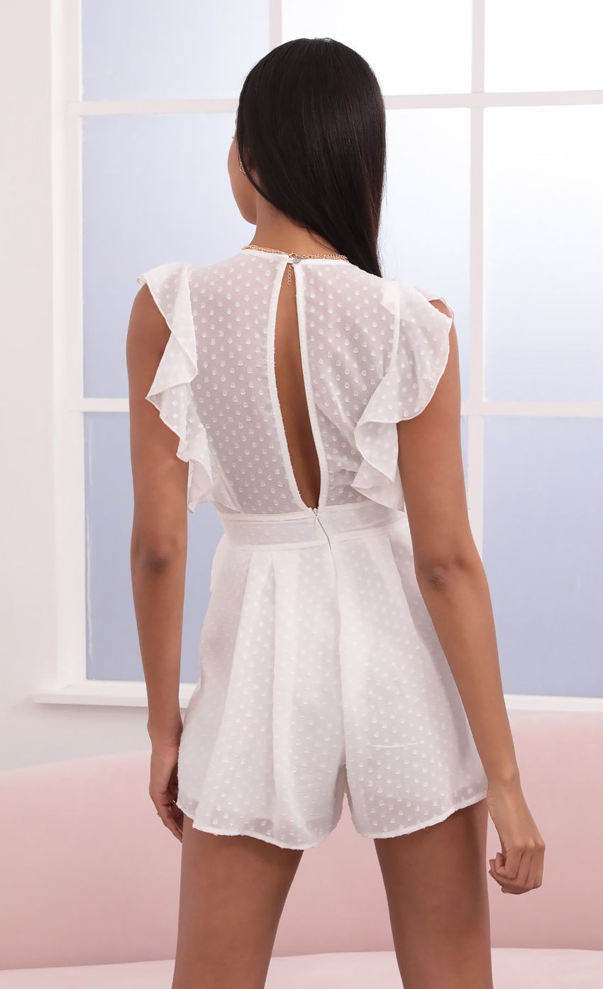 Picture Ruffle White Romper in Dotted Chiffon. Source: https://media-img.lucyinthesky.com/data/Jun21_1/850xAUTO/1V9A4002.JPG