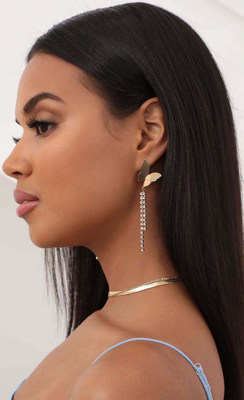 Picture Long Gold Butterfly Earrings. Source: https://media-img.lucyinthesky.com/data/Jun21_1/850xAUTO/AT2A1237.JPG