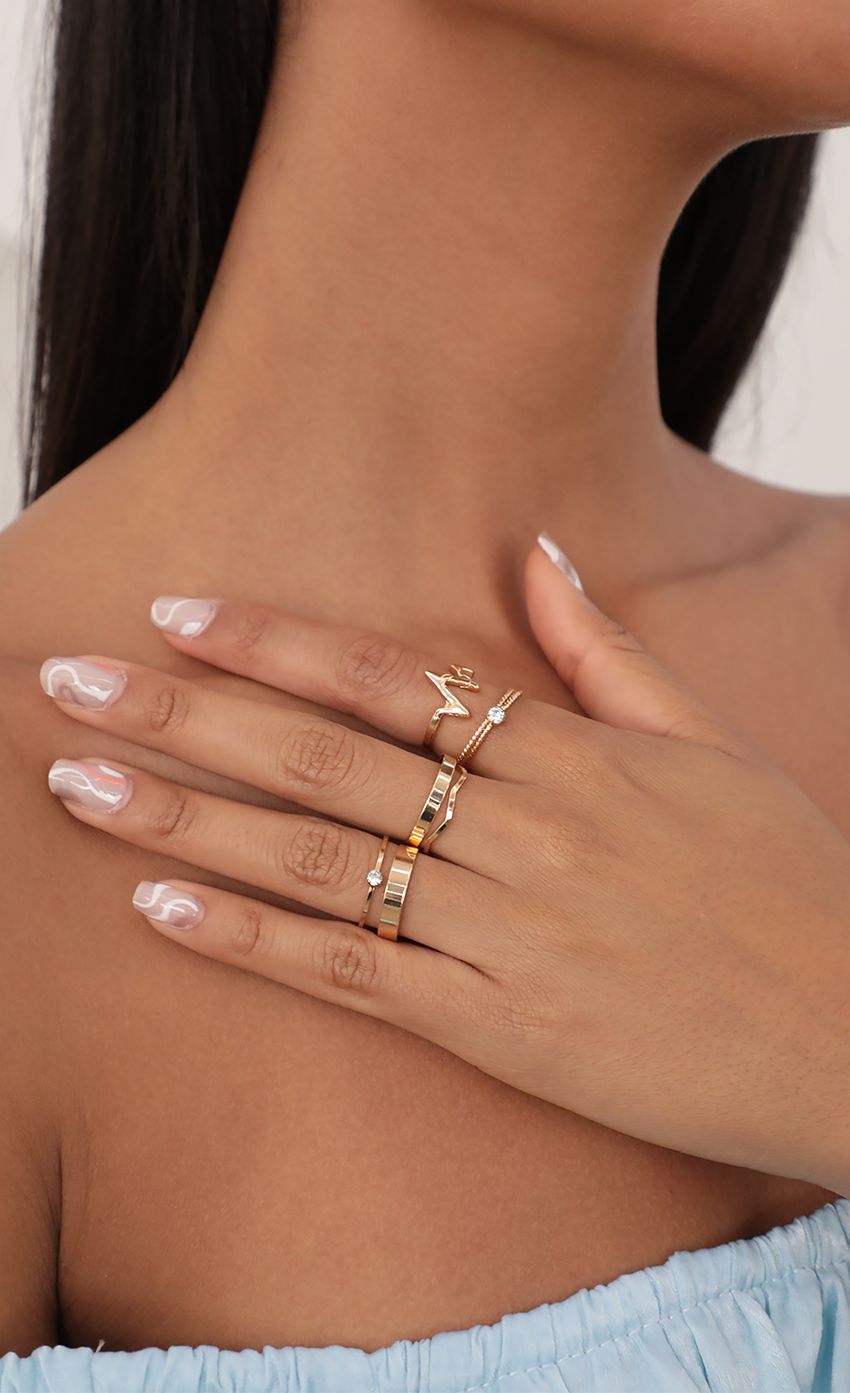 Picture Minimal Bands Ring Set in Gold. Source: https://media-img.lucyinthesky.com/data/Jun21_1/850xAUTO/AT2A1751.JPG