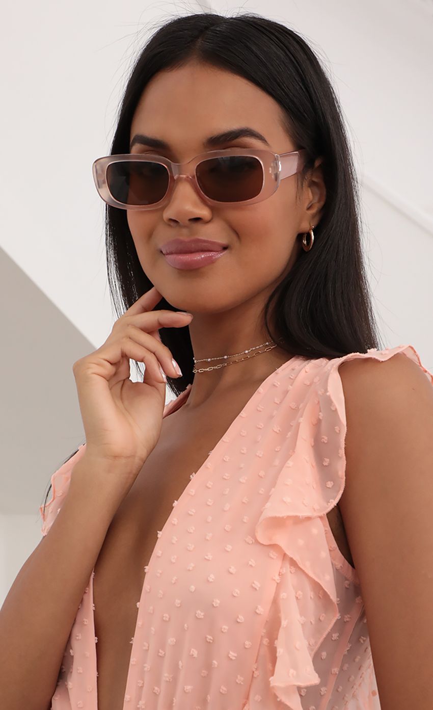 Picture Beverly Rectangular Retro Sunglasses in Nude. Source: https://media-img.lucyinthesky.com/data/Jun21_1/850xAUTO/AT2A2651.JPG
