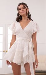 Picture Eliza Wrap Dress in Cream. Source: https://media-img.lucyinthesky.com/data/Jun21_2/150xAUTO/1V9A1707.JPG