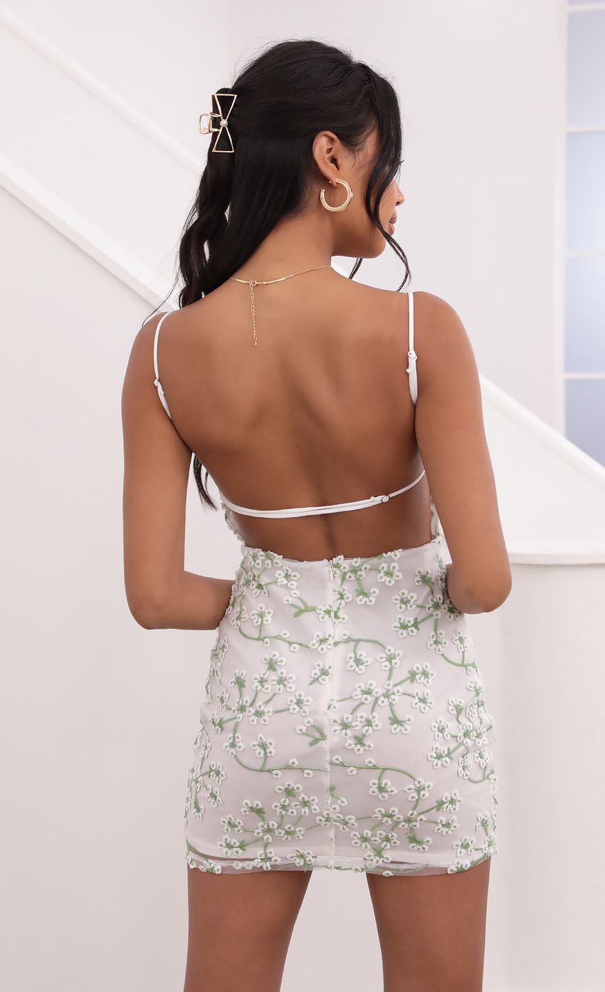 Picture Embroidered Floral Dress in White. Source: https://media-img.lucyinthesky.com/data/Jun21_2/850xAUTO/1V9A1155.JPG