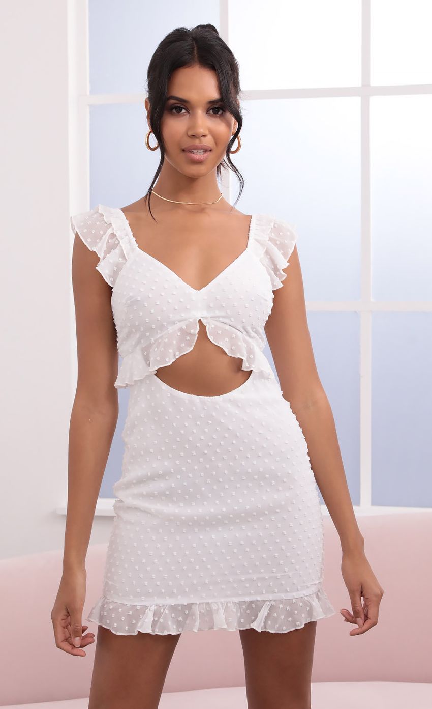 Picture Dotted Chiffon Dress in White. Source: https://media-img.lucyinthesky.com/data/Jun21_2/850xAUTO/1V9A1207.JPG