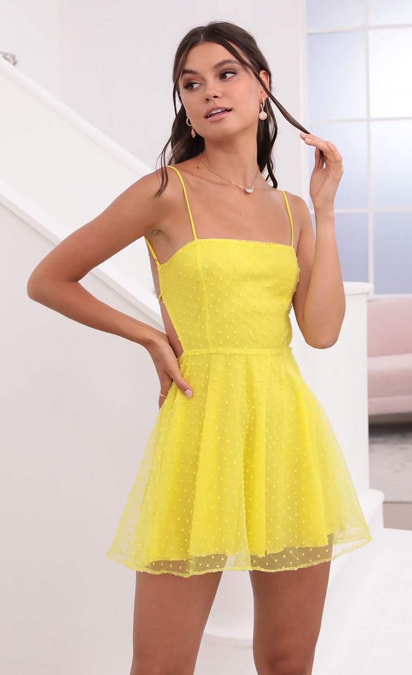 Picture Floral A-Line Dress in Yellow. Source: https://media-img.lucyinthesky.com/data/Jun21_2/850xAUTO/1V9A1936.JPG