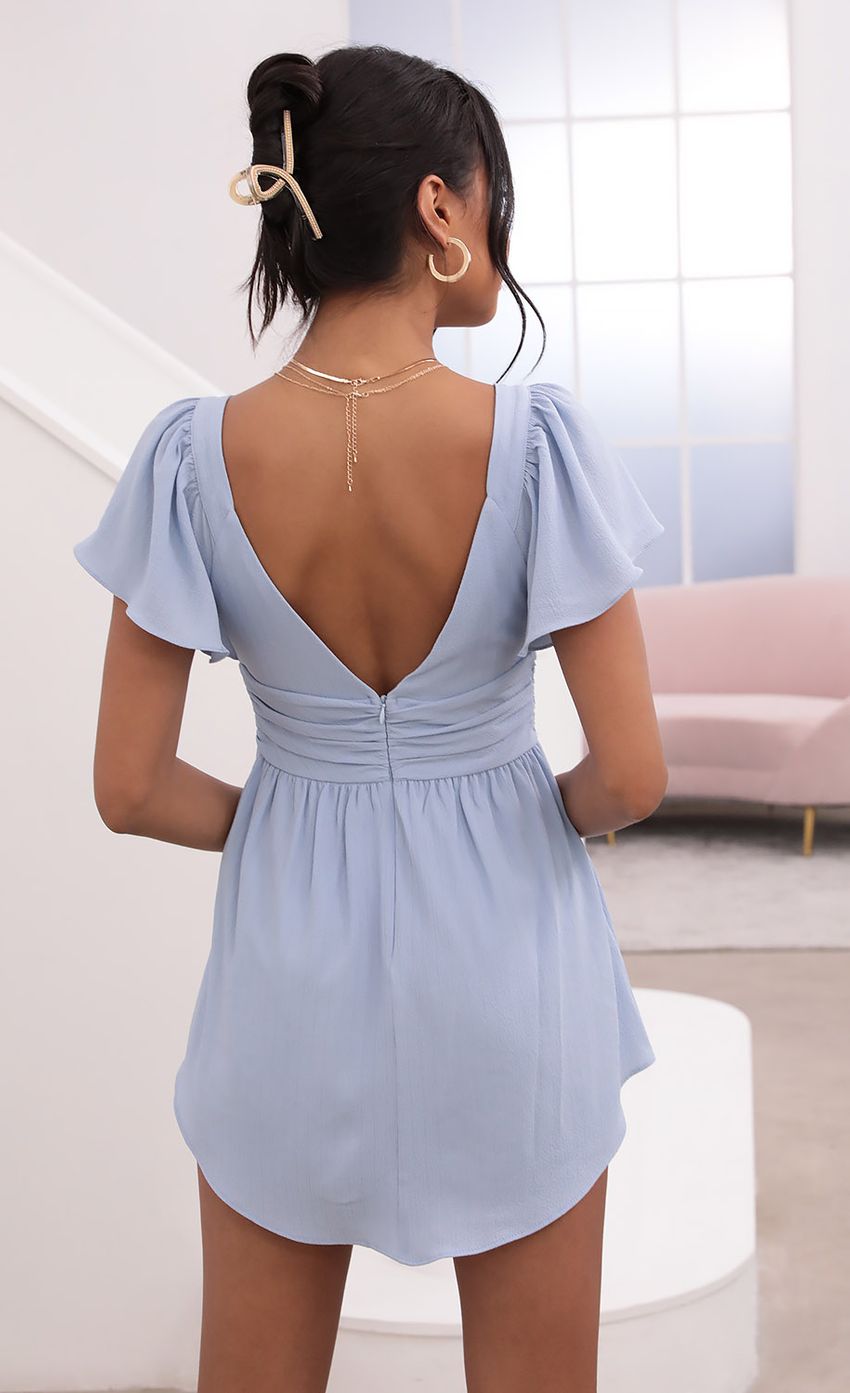 Picture Flutter Sleeved Dress in Baby Blue. Source: https://media-img.lucyinthesky.com/data/Jun21_2/850xAUTO/1V9A2018.JPG
