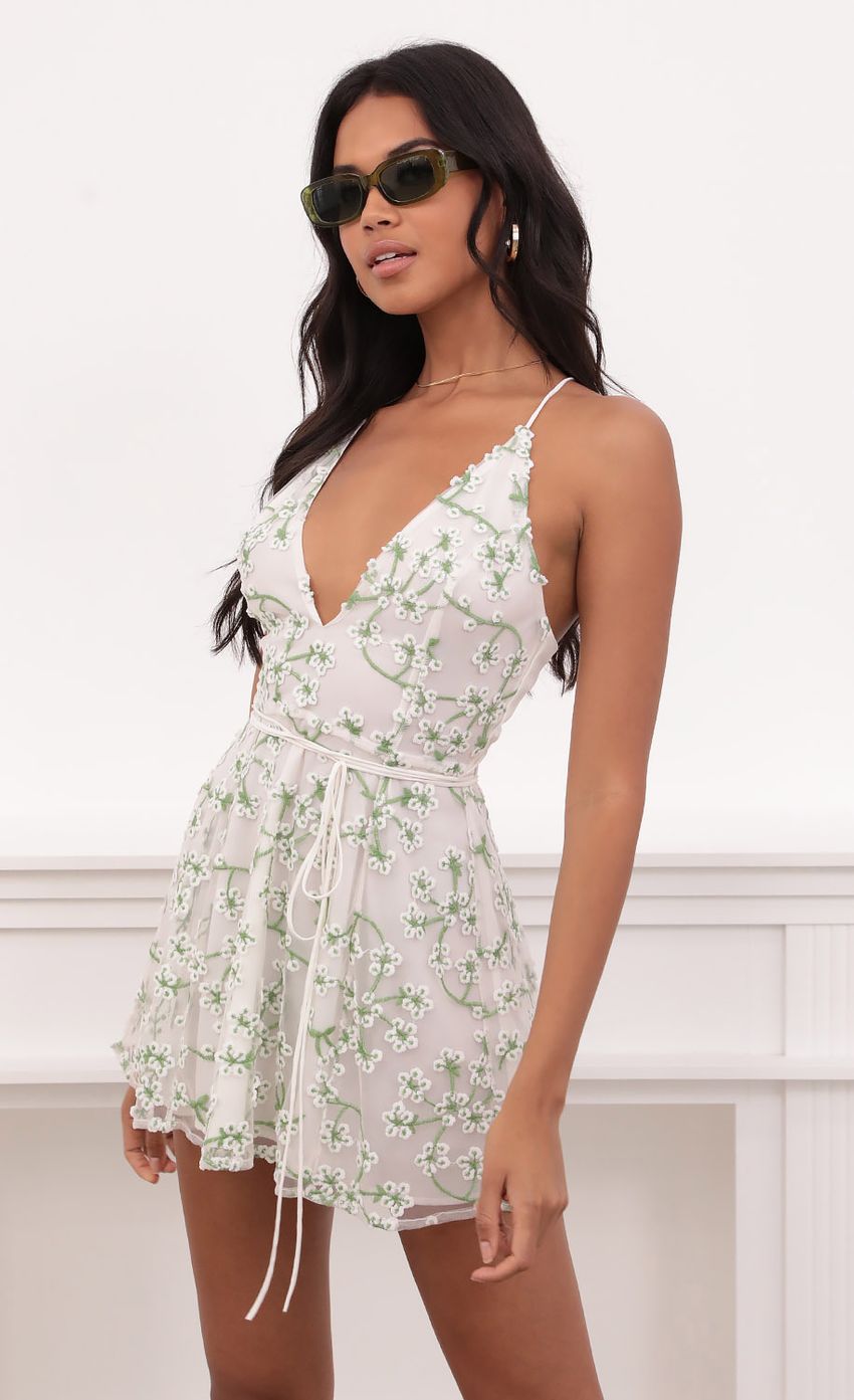 Picture Embroidered Floral Dress in White. Source: https://media-img.lucyinthesky.com/data/Jun21_2/850xAUTO/1V9A28671.JPG