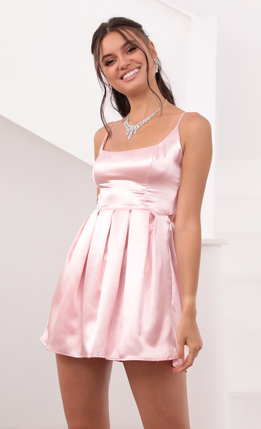 Picture Pleated Dress in Pink. Source: https://media-img.lucyinthesky.com/data/Jun21_2/850xAUTO/1V9A3570.JPG