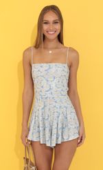 Picture Floral Pleated Romper in Blue. Source: https://media-img.lucyinthesky.com/data/Jun22_1/150xAUTO/1V9A0714.JPG