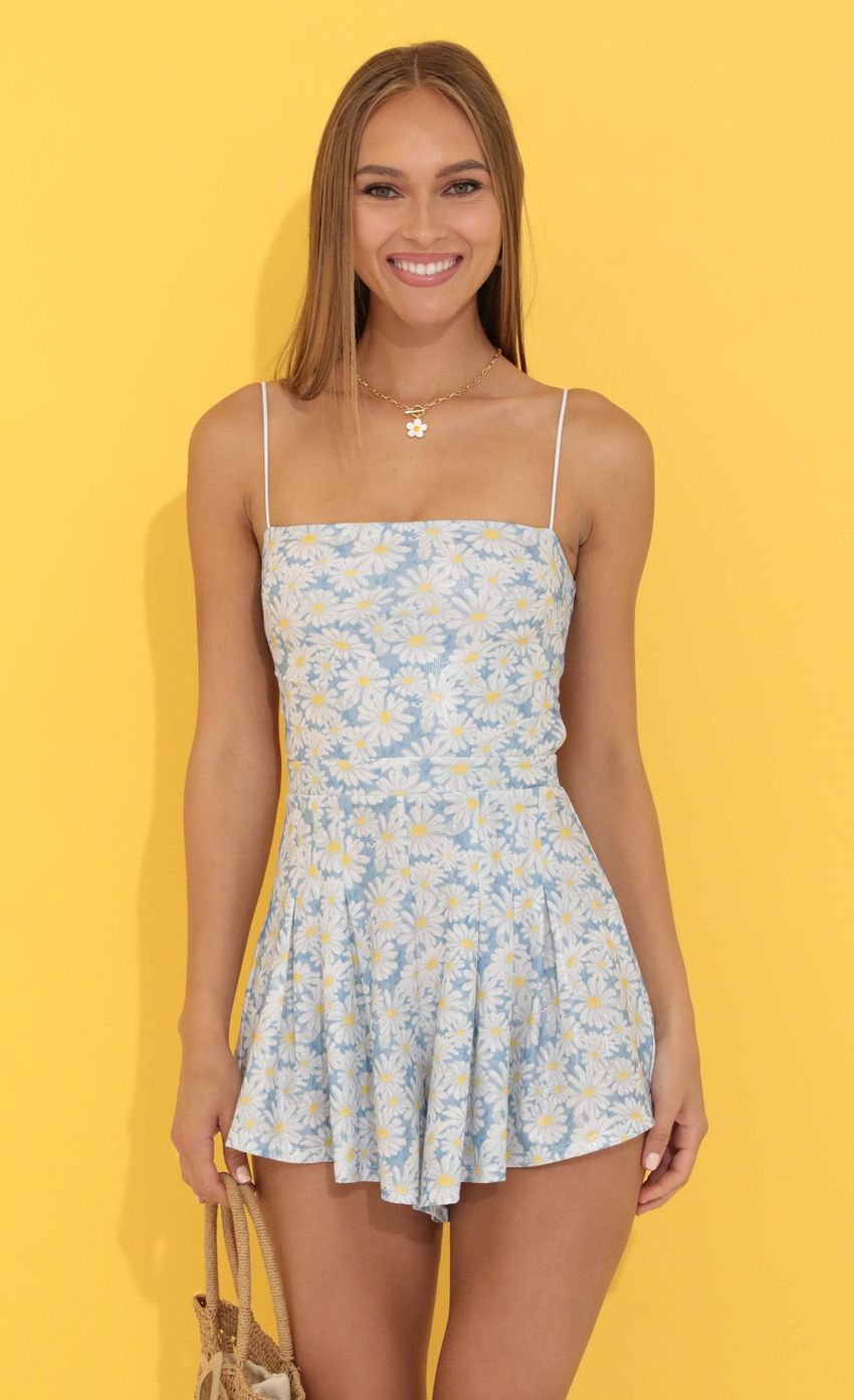 Picture Floral Pleated Romper in Blue. Source: https://media-img.lucyinthesky.com/data/Jun22_1/850xAUTO/1V9A0714.JPG
