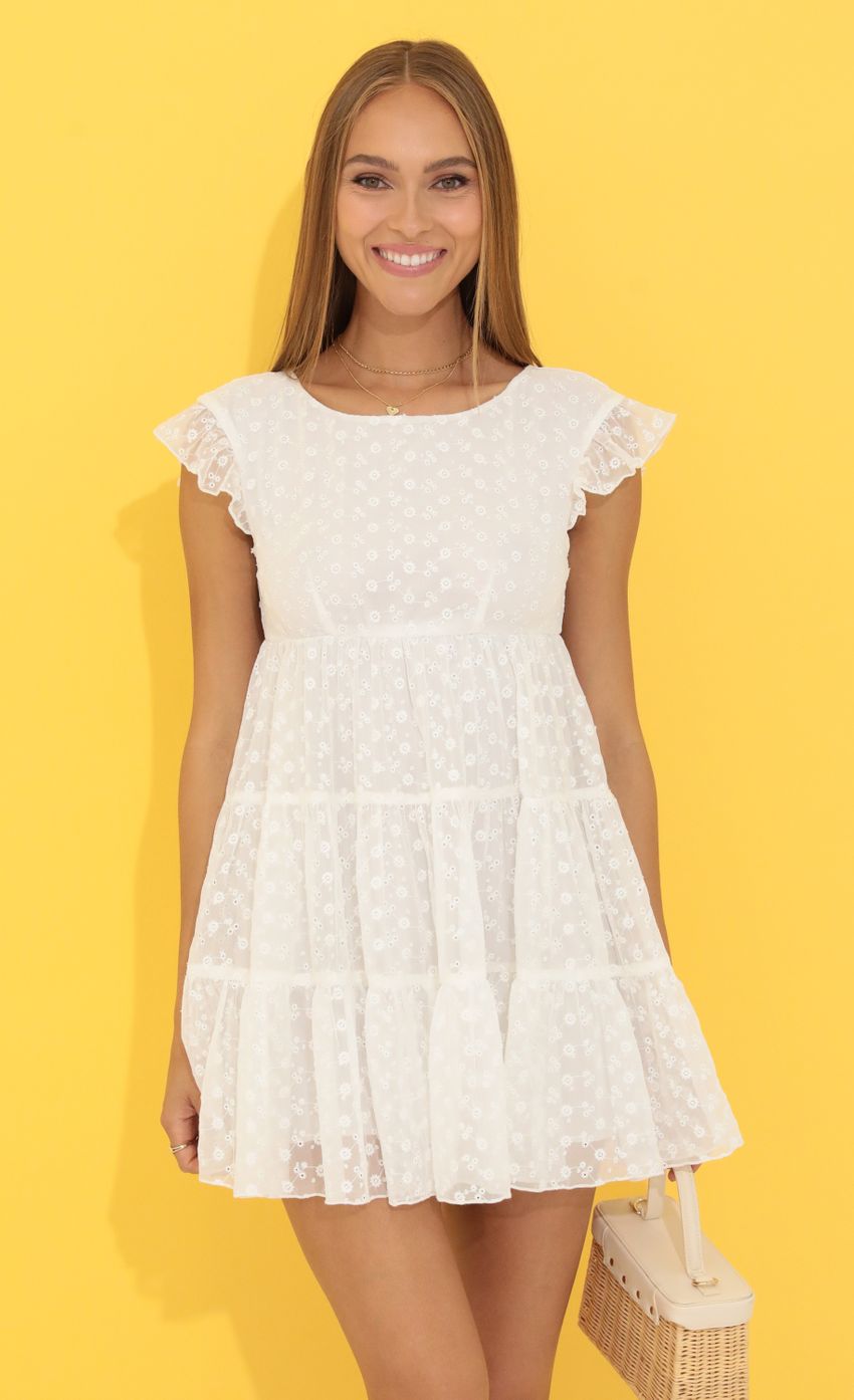 Picture Chiffon Embroidered Baby Doll Dress in White. Source: https://media-img.lucyinthesky.com/data/Jun22_1/850xAUTO/1V9A6452.JPG