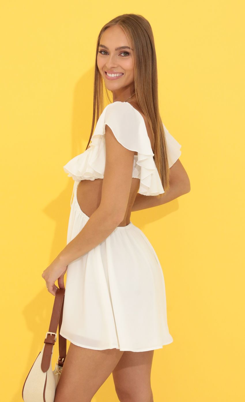 Picture Cutout Ruffle Dress in White. Source: https://media-img.lucyinthesky.com/data/Jun22_1/850xAUTO/1V9A8284.JPG