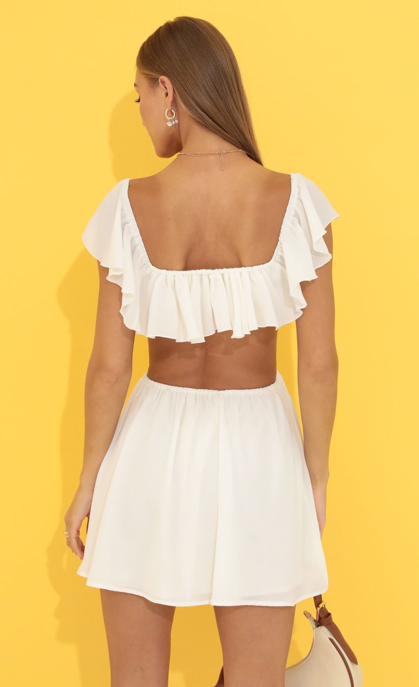 Picture Cutout Ruffle Dress in White. Source: https://media-img.lucyinthesky.com/data/Jun22_1/850xAUTO/1V9A8307.JPG
