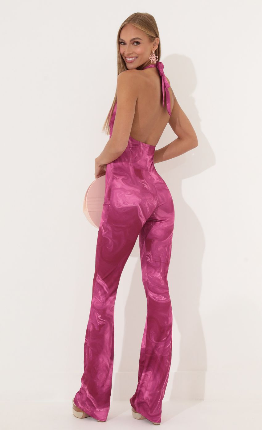 Picture Freya Swirl Jumpsuit in Pink. Source: https://media-img.lucyinthesky.com/data/Jun22_2/850xAUTO/1V9A0940.JPG