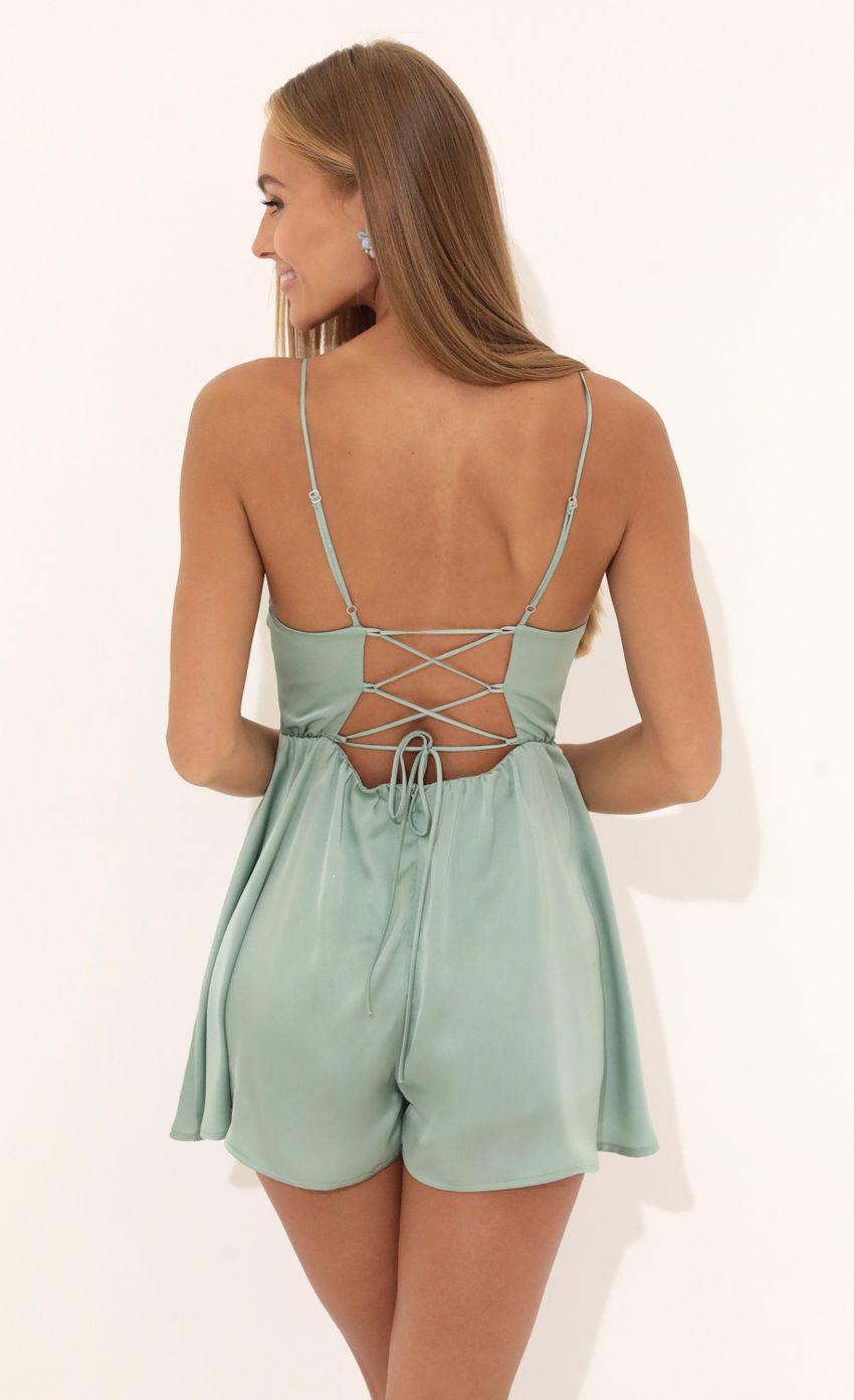 Picture Day Satin Romper in Green. Source: https://media-img.lucyinthesky.com/data/Jun22_2/850xAUTO/1V9A2207.JPG