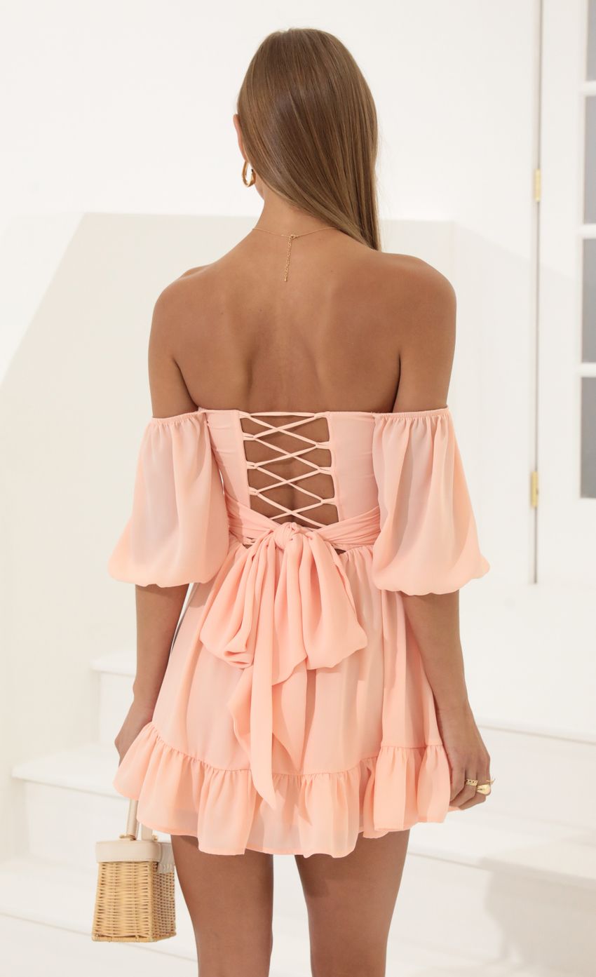 Picture Off The Shoulder Dress in Peach. Source: https://media-img.lucyinthesky.com/data/Jun22_2/850xAUTO/1V9A4251.JPG