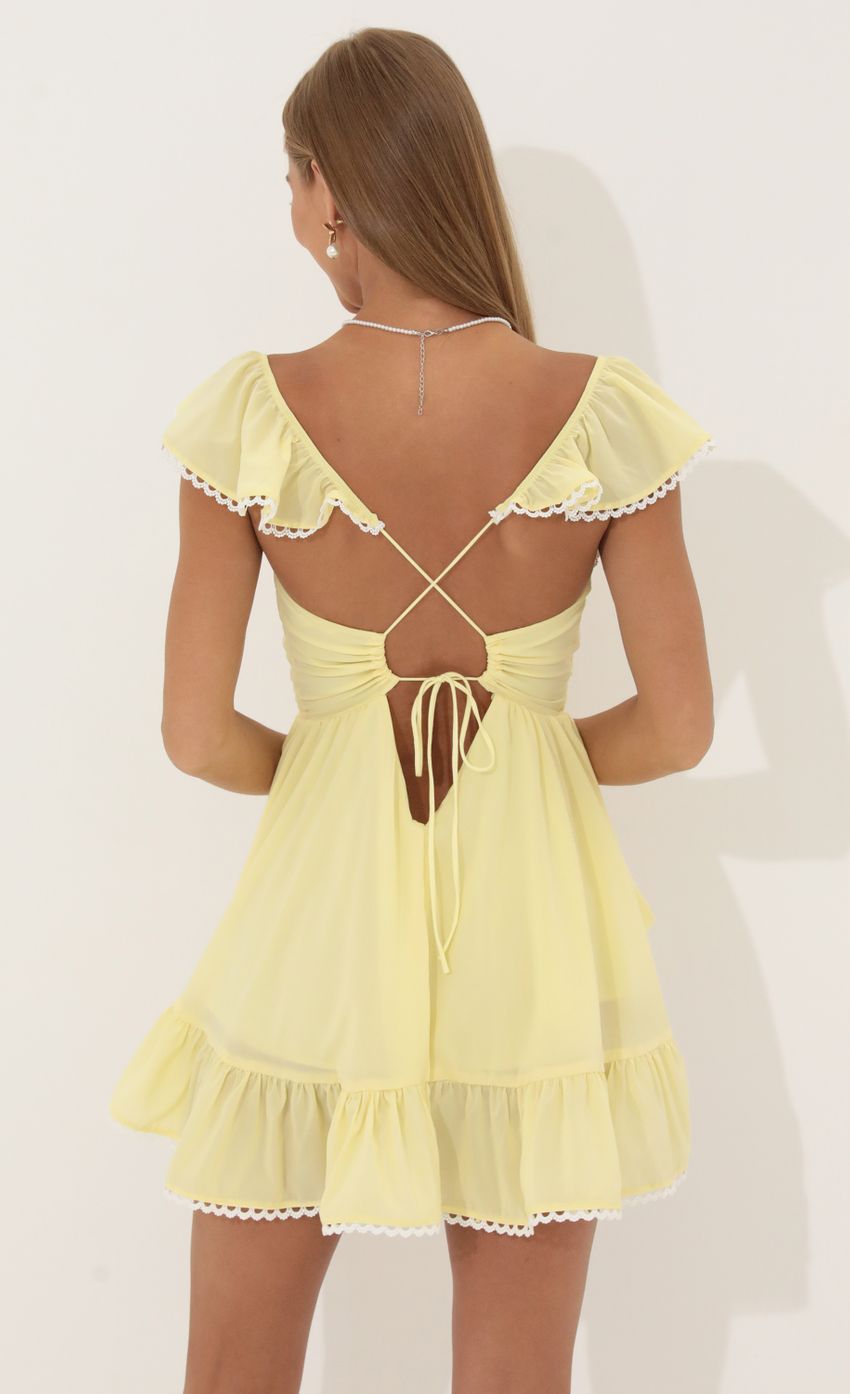 Picture Fit and Flare Chiffon Dress in Yellow. Source: https://media-img.lucyinthesky.com/data/Jun22_2/850xAUTO/1V9A4720.JPG