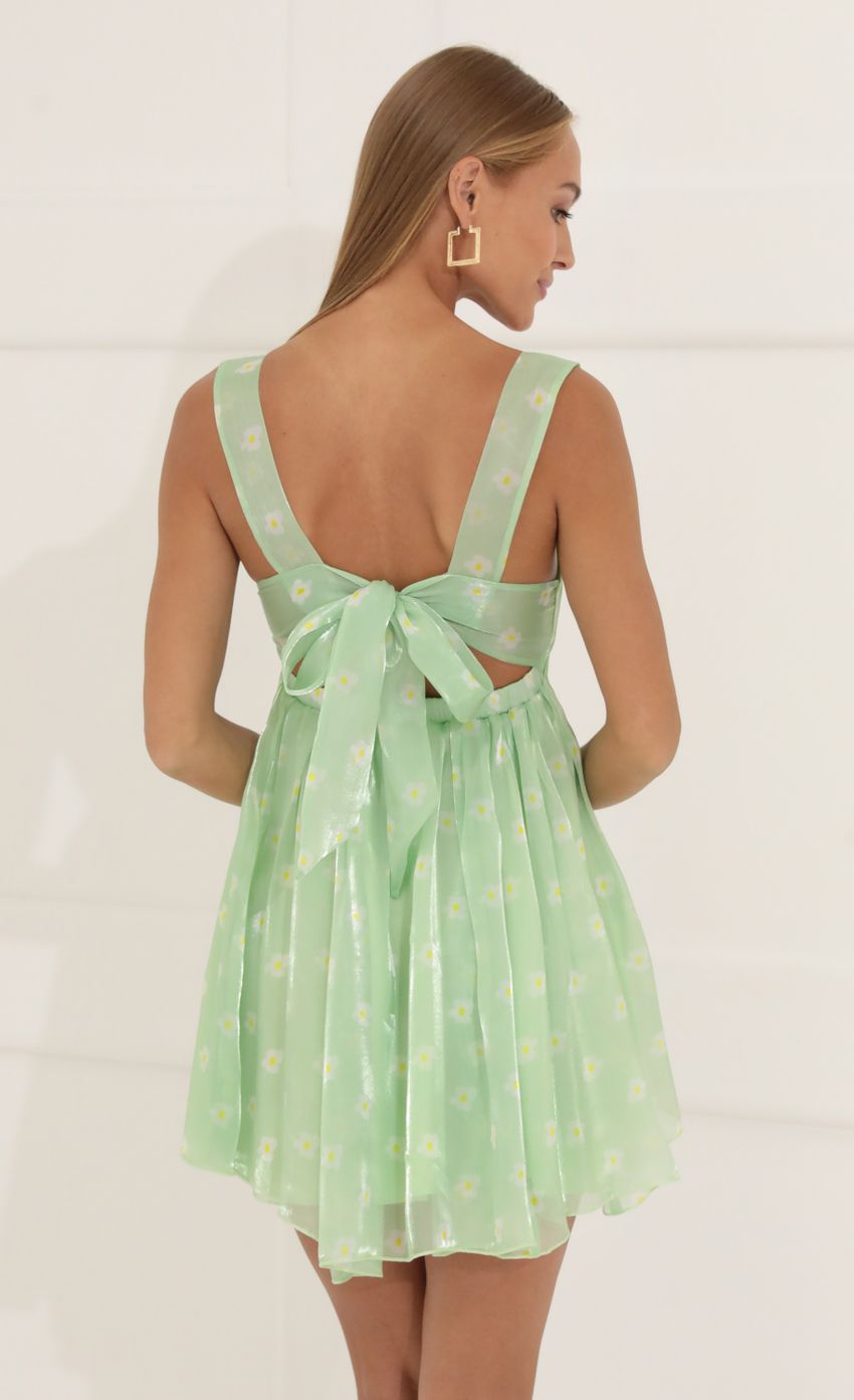 Picture Floral Organza Baby Doll Dress in Green. Source: https://media-img.lucyinthesky.com/data/Jun22_2/850xAUTO/1V9A4864.JPG