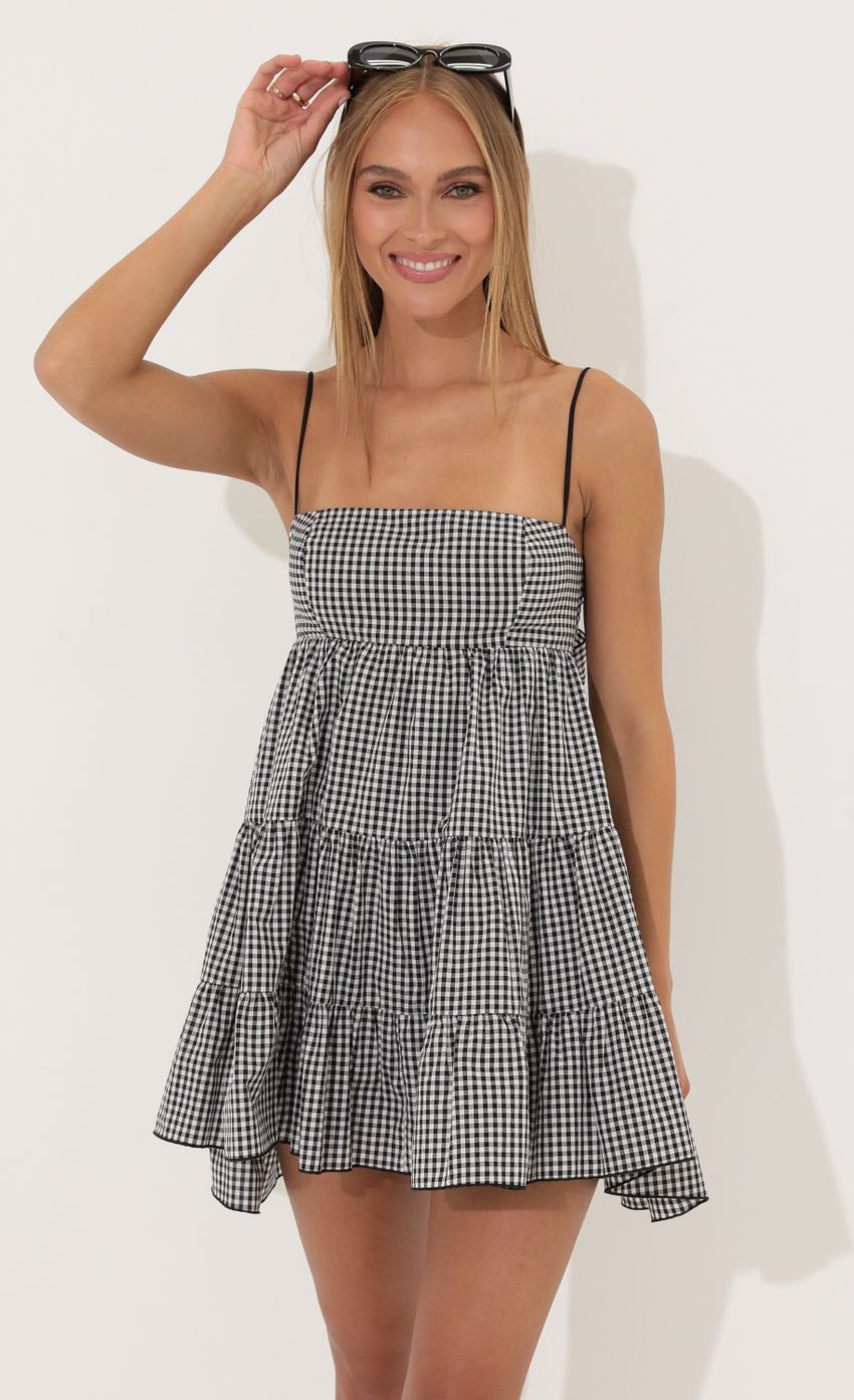 Picture Cotton Checkered Dress in Black. Source: https://media-img.lucyinthesky.com/data/Jun22_2/850xAUTO/1V9A5459.JPG