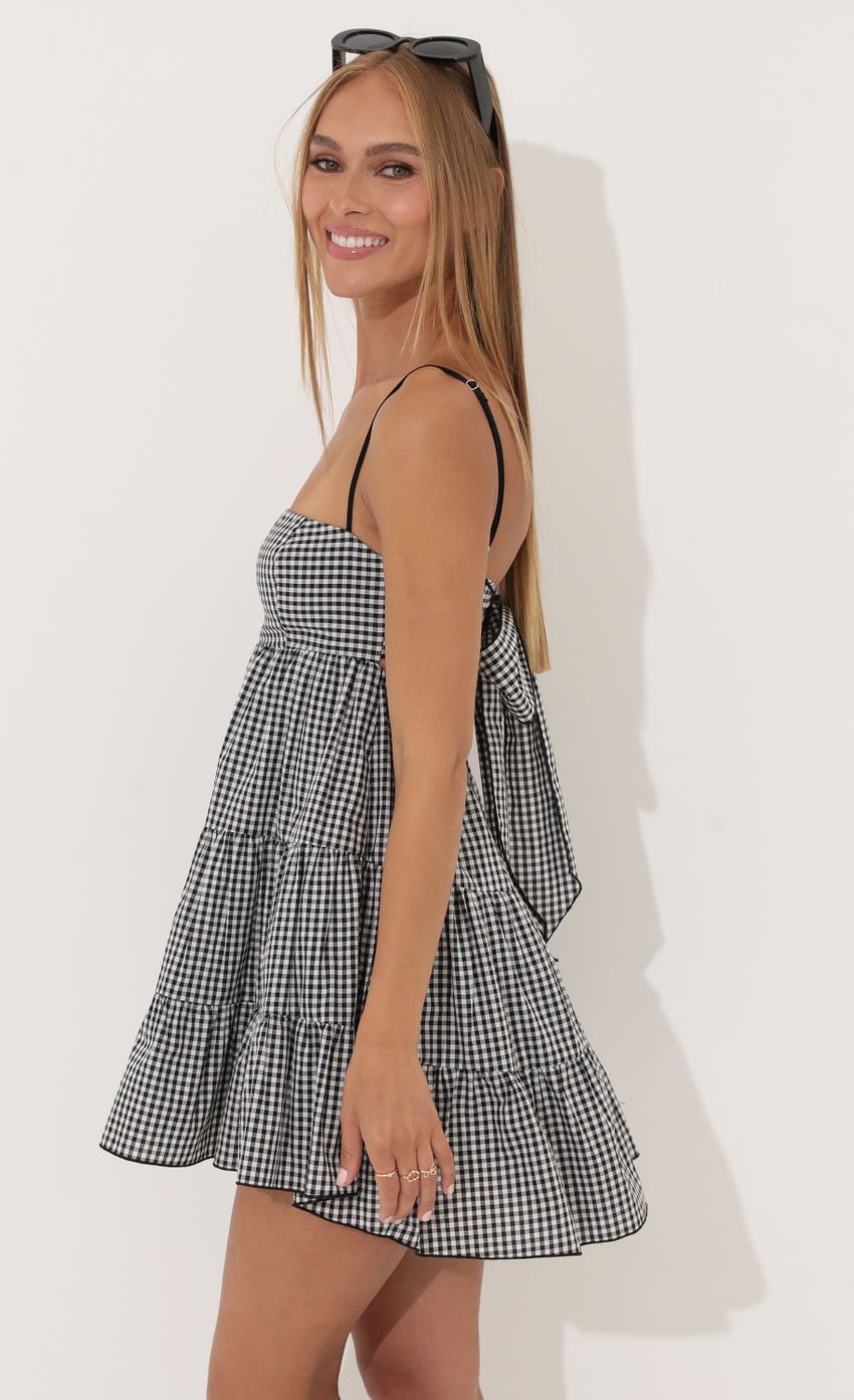 Picture Cotton Checkered Dress in Black. Source: https://media-img.lucyinthesky.com/data/Jun22_2/850xAUTO/1V9A5489.JPG