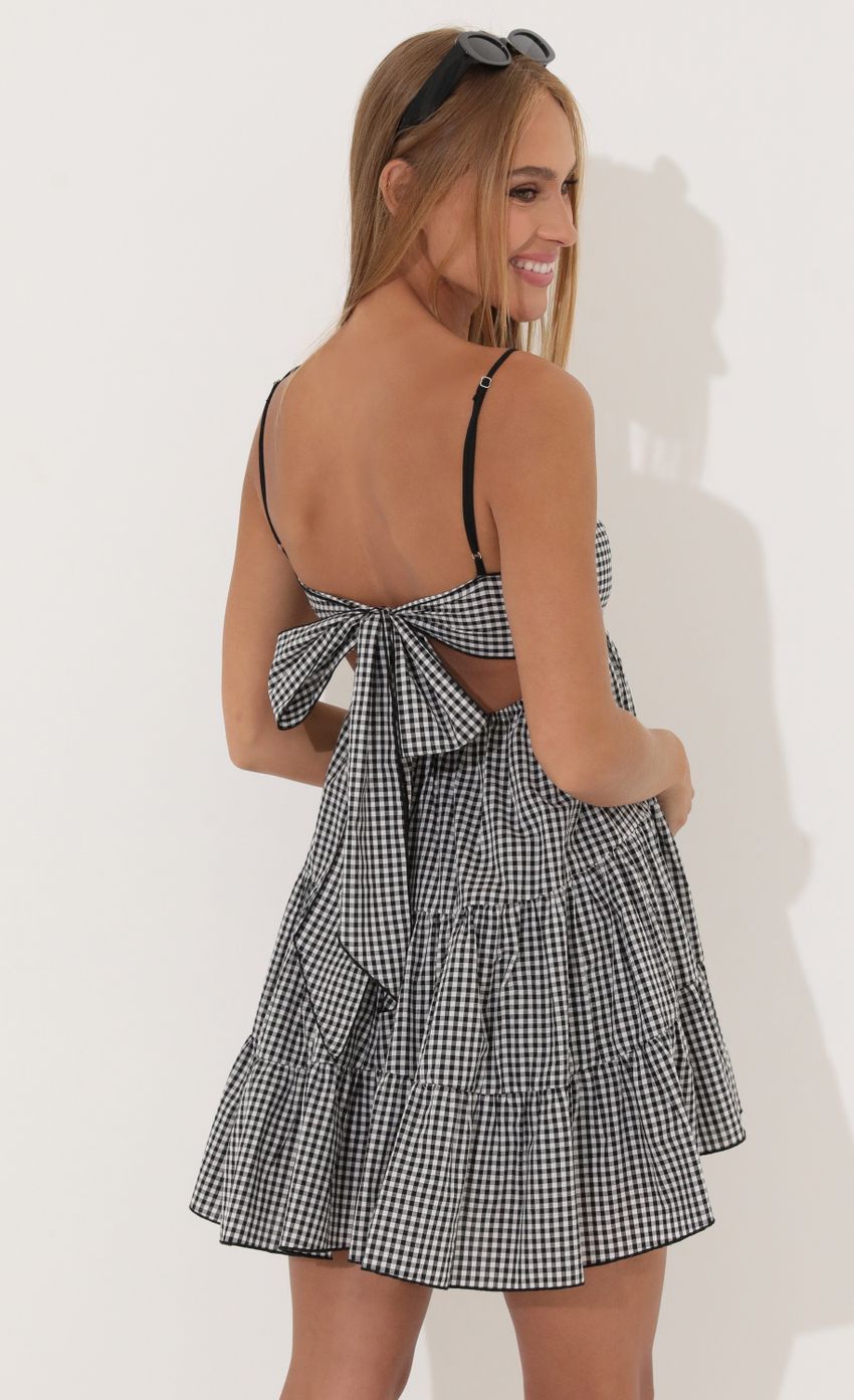 Picture Cotton Checkered Dress in Black. Source: https://media-img.lucyinthesky.com/data/Jun22_2/850xAUTO/1V9A5597.JPG