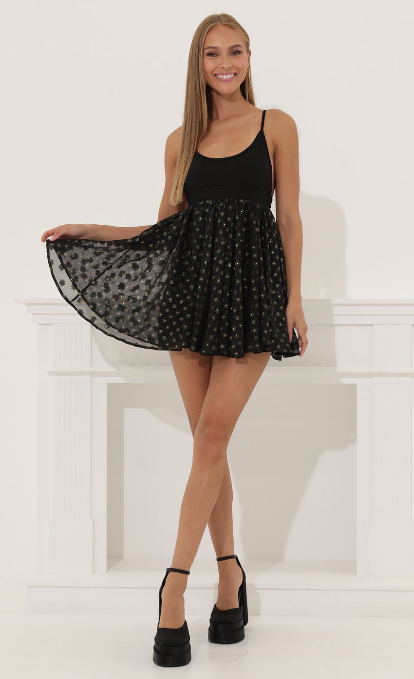 Picture Floral Baby Doll Dress in Black. Source: https://media-img.lucyinthesky.com/data/Jun22_2/850xAUTO/1V9A7062.JPG