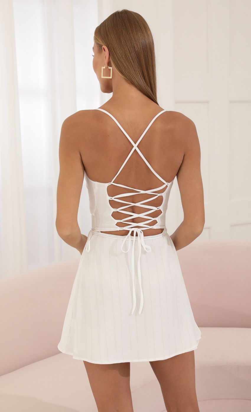 Picture Crepe Pinstripe Cutout Dress in White. Source: https://media-img.lucyinthesky.com/data/Jun22_2/850xAUTO/1V9A7994.JPG