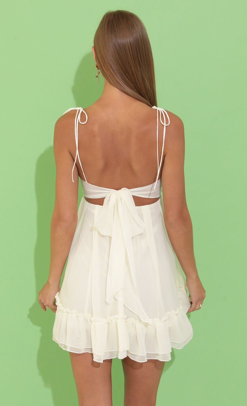Picture Chiffon Baby Doll Dress in Cream. Source: https://media-img.lucyinthesky.com/data/Jun22_2/850xAUTO/1V9A9072.JPG