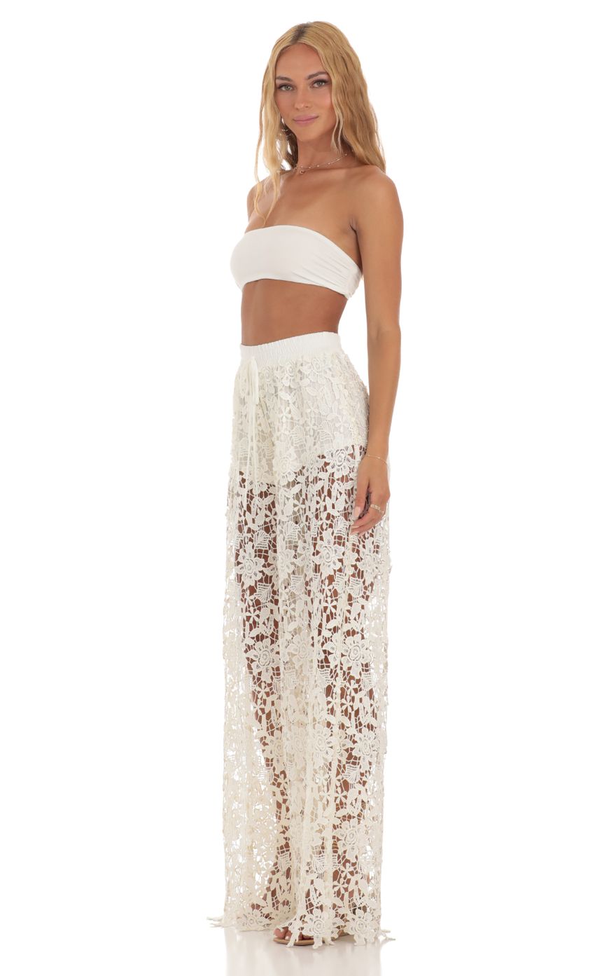 Picture Crochet Two Piece Pants Set in Ivory. Source: https://media-img.lucyinthesky.com/data/Jun23/850xAUTO/019fa2e9-f6fc-4c2f-a326-6febc428dd33.jpg