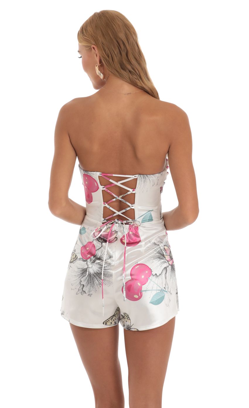 Picture Cherry Butterfly Strapless Romper in White. Source: https://media-img.lucyinthesky.com/data/Jun23/850xAUTO/072b6733-2ca0-4c79-8029-5da91169efbe.jpg