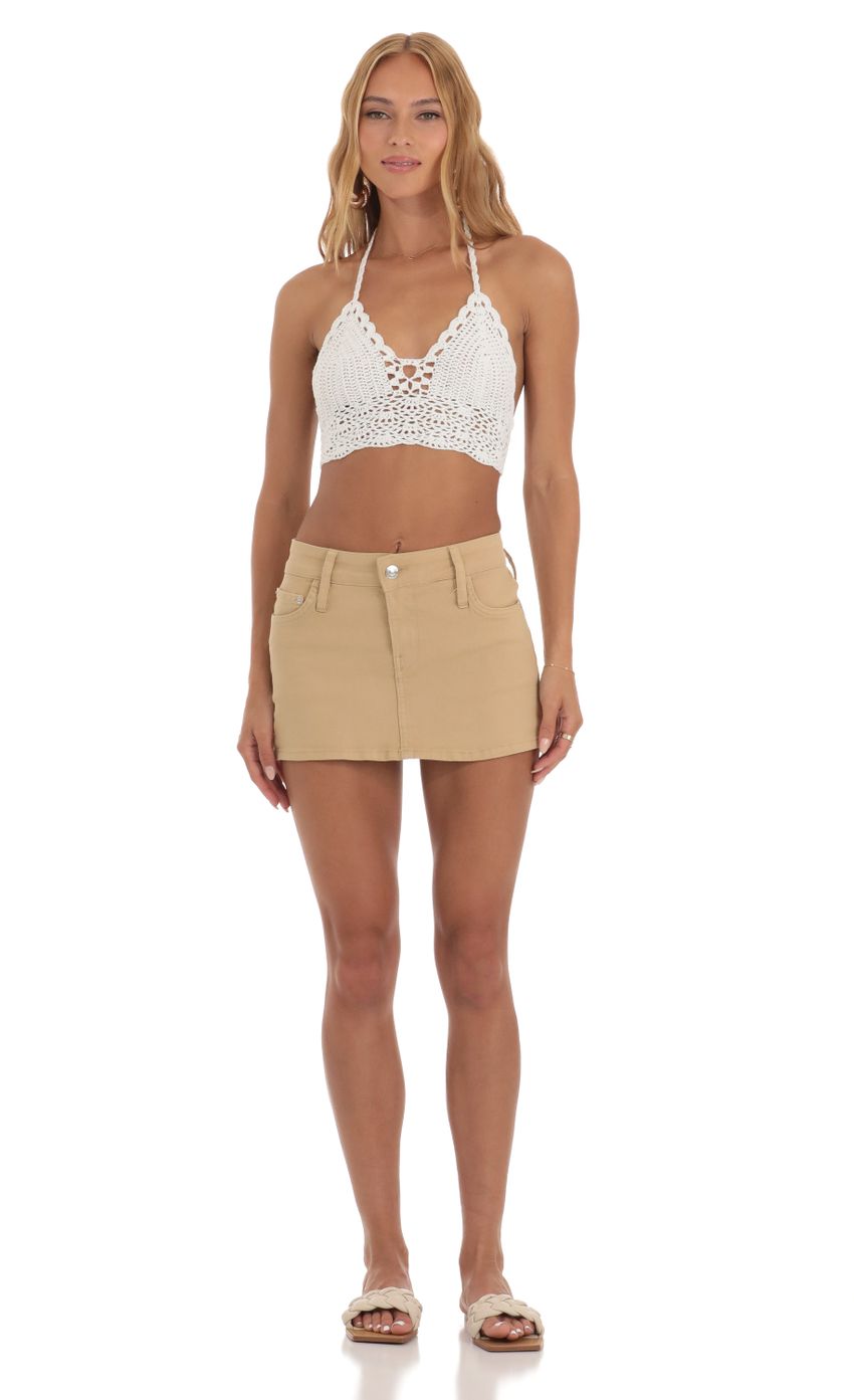 Picture Crochet Top in White. Source: https://media-img.lucyinthesky.com/data/Jun23/850xAUTO/0b58eab6-46ec-4bb9-af92-316357d83d47.jpg