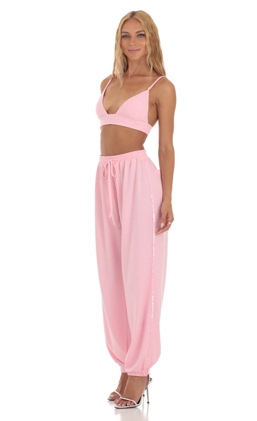 Picture Sequin Two Piece Set in Pink. Source: https://media-img.lucyinthesky.com/data/Jun23/850xAUTO/1c796334-531c-4e4b-be85-6c97387a78e7.jpg