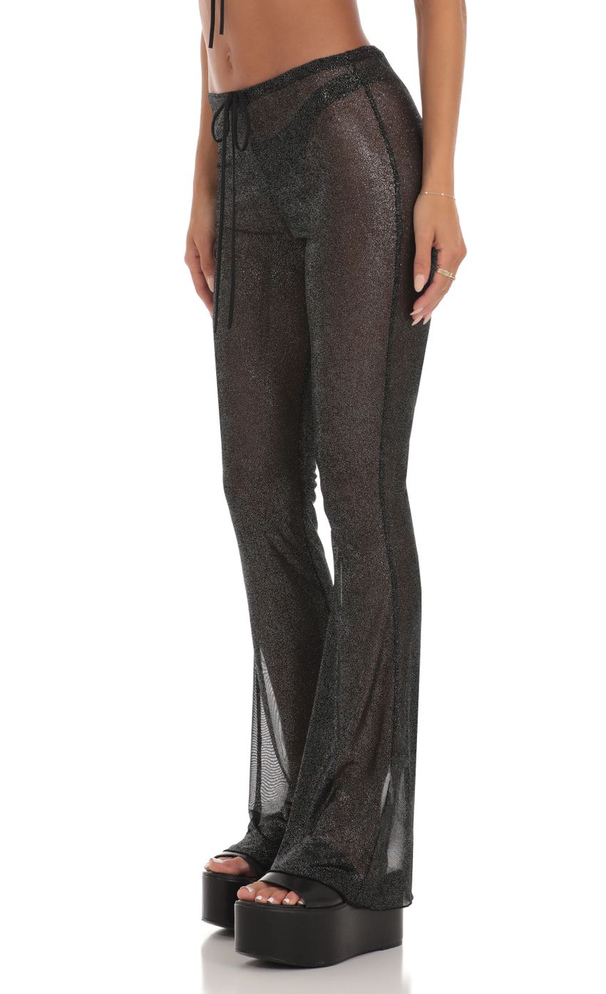 Picture Shimmer Three Piece Pant Set in Black. Source: https://media-img.lucyinthesky.com/data/Jun23/850xAUTO/2122bac2-6044-4978-bc67-7b4af892697c.jpg