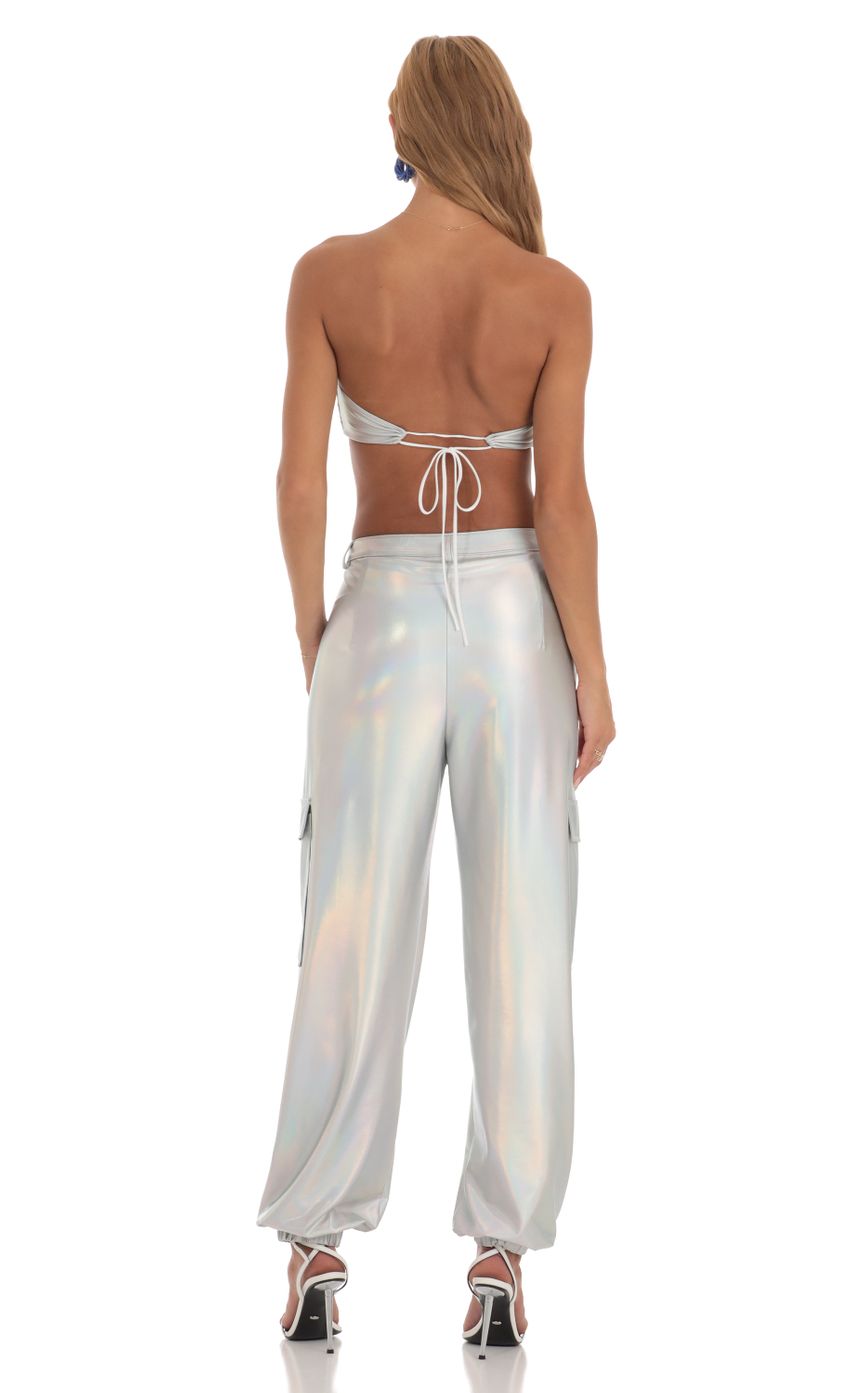 Picture Holographic Pants in Silver. Source: https://media-img.lucyinthesky.com/data/Jun23/850xAUTO/2f64031a-90b5-49fa-9fdf-d2578a9ab533.jpg